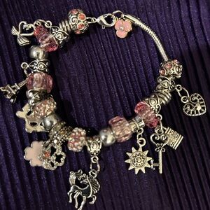 Charming Silver Bracelet with Pink Accents